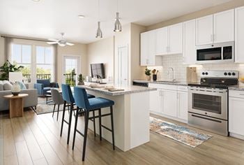 Gorgeous luxury vinyl plank flooring in living room, kitchen & bathroom